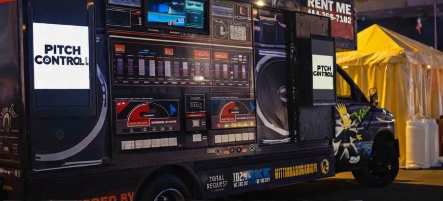 The Boombox mobile DJ truck at an outdoor event
